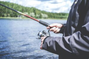 older man fishing for dinner