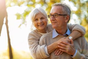 Seniors hugging after meeting on SilverSingles dating site